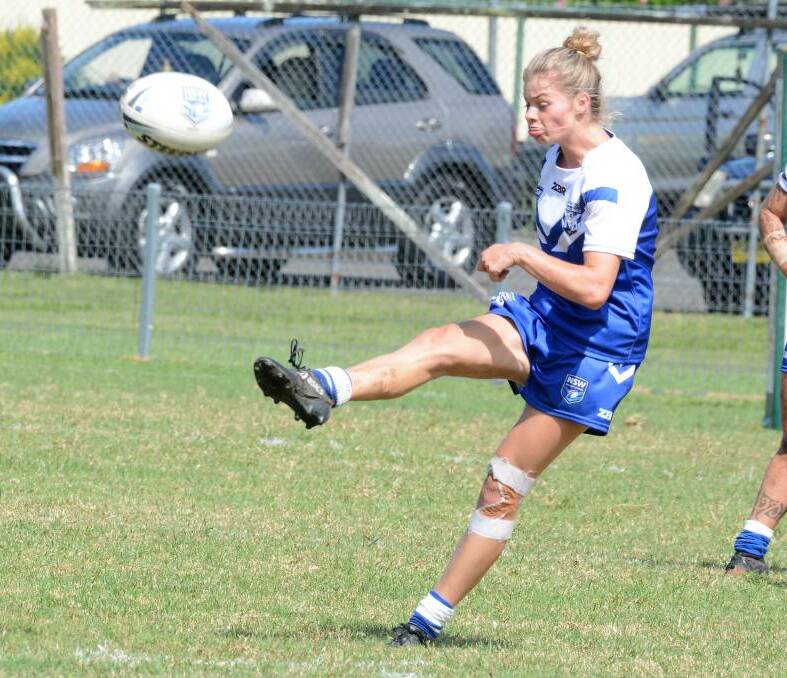 North Coast captain Larissa Ward kicks in general play in the Country Championship game against Illawarra-South Coast at Taree this year.