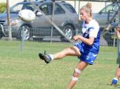 North Coast captain Larissa Ward kicks in general play in the Country Championship game against Illawarra-South Coast at Taree this year.