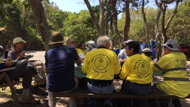 SWR Community Dune Care volunteers enjoying lunch after work at South Smoky beach