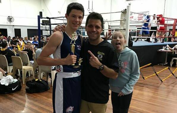 HOW GOOD: Levi Langham, coach Adam Fathers and Levi's sister Shani at the Gold Coast PCYC on Saturday