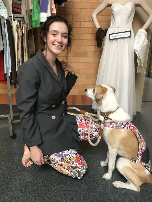 TAFE NSW student Bree Parker and her service dog, Nala