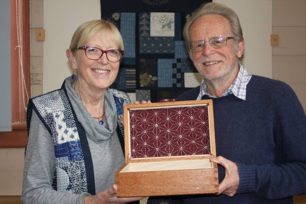 Jenny and Roger Gifkins with an embroidery box for the exhibition