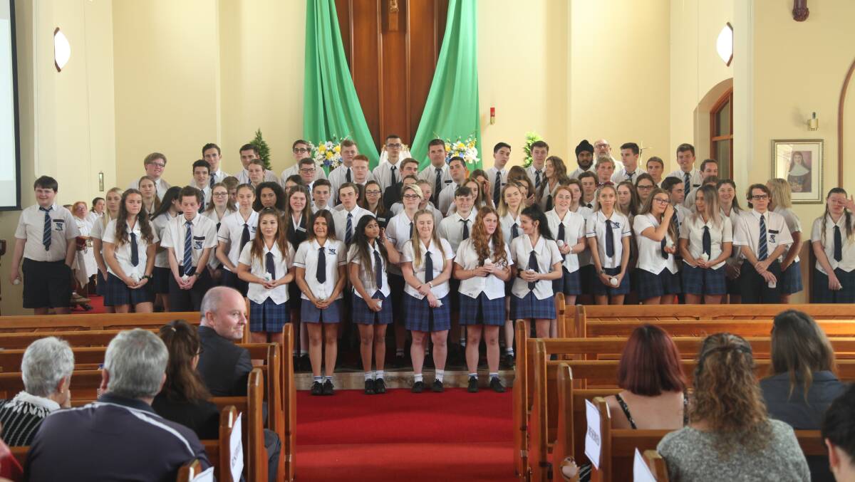 Year 12 in All Saints Church in Kempsey with Fr Paul Gooley and principal Kevin Lewis