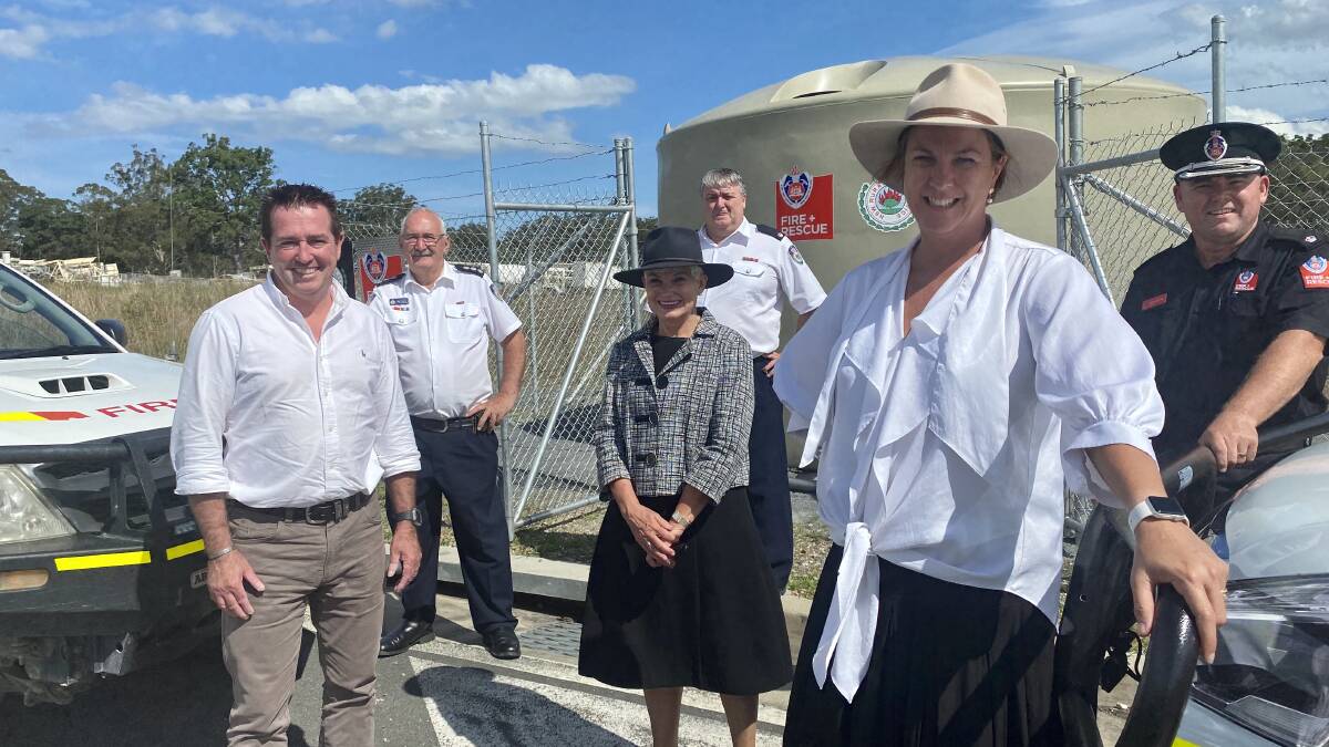 The new water storage tank at the Clybucca rest area. Pictured at front are Paul Toole, Liz Campbell and Melinda Pavey