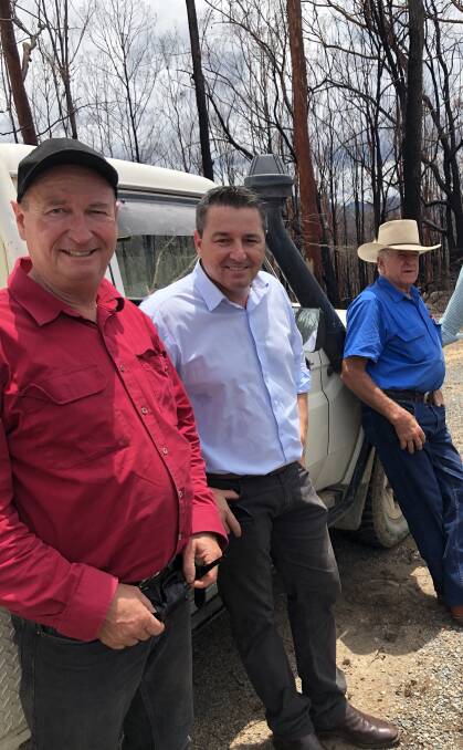 MP Pat Conaghan (centre) on scene with local residents after the fires which tore through Willawarrin, Taylors Arm and the western areas of the Macleay and Nambucca valleys