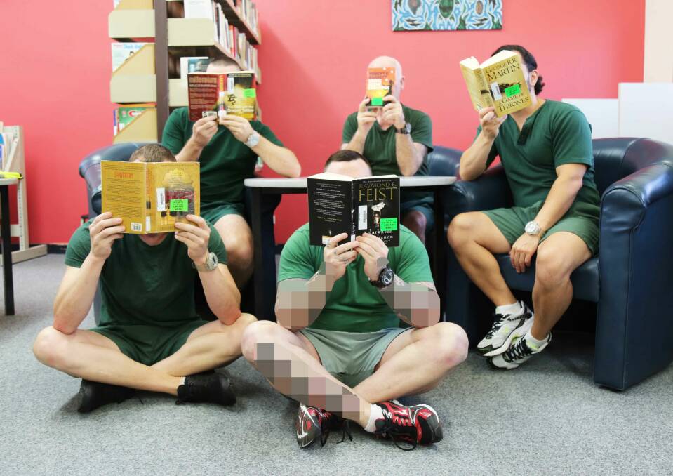 Inmates enjoy the top five borrowed books for 2019 (photo courtesy of CSNSW)