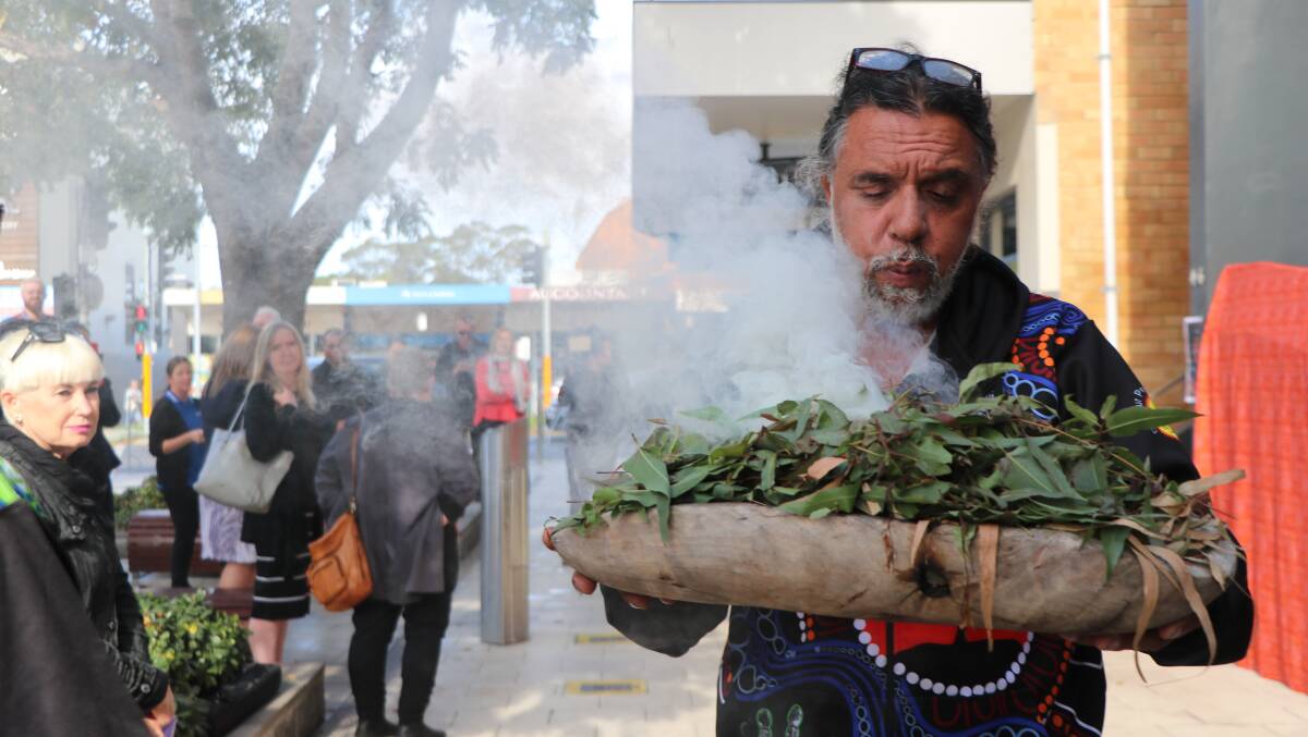 The smoking ceremony at the unveiling of the Corroboree Magic mosaic in Kempsey