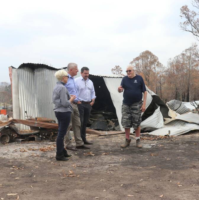 Kempsey Shire mayor Liz Campbell, Deputy Prime Minister Michael McCormack and Member for Cowper Pat Conaghan met with Willawarrin resident Ian Sheridan on Sunday. Mr Sheridan, 74, who is the deputy captain of the Willawarrin fire brigade had been helping save other peoples homes when his burned on November 8