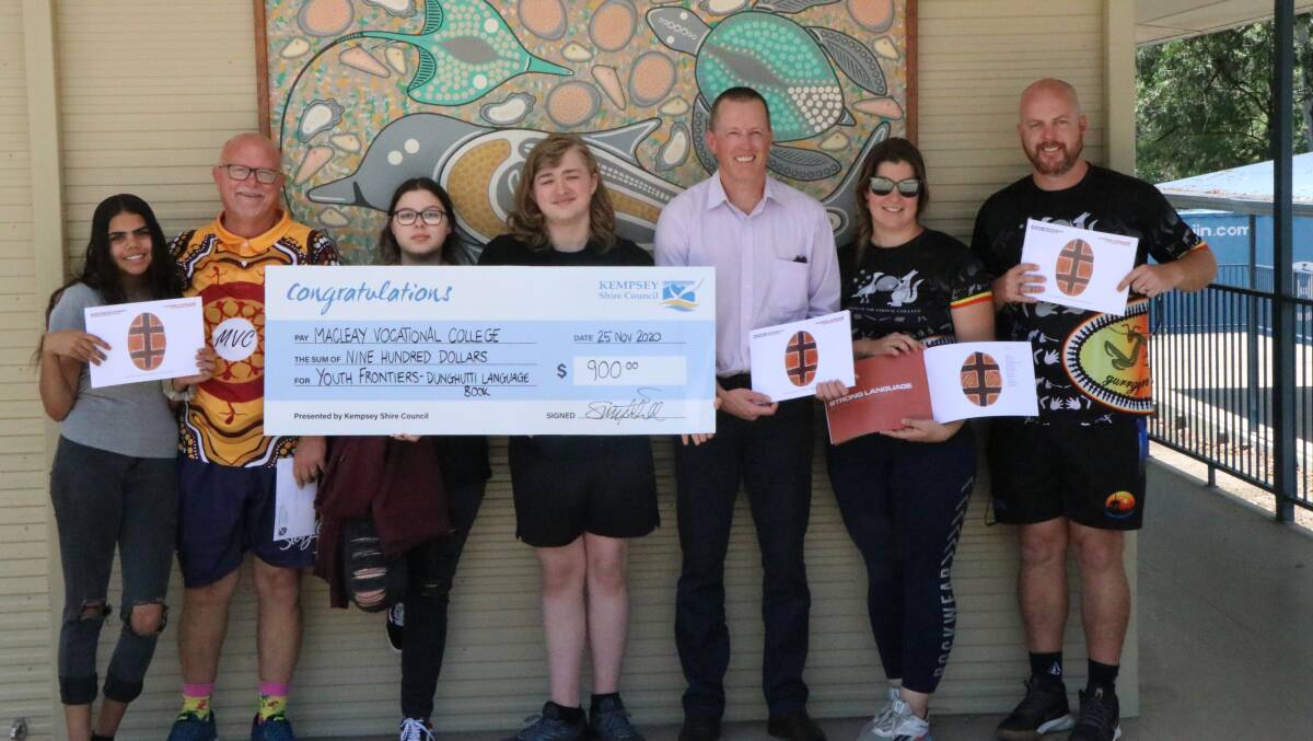 Council staff presenting funding to the Youth Frontier Project