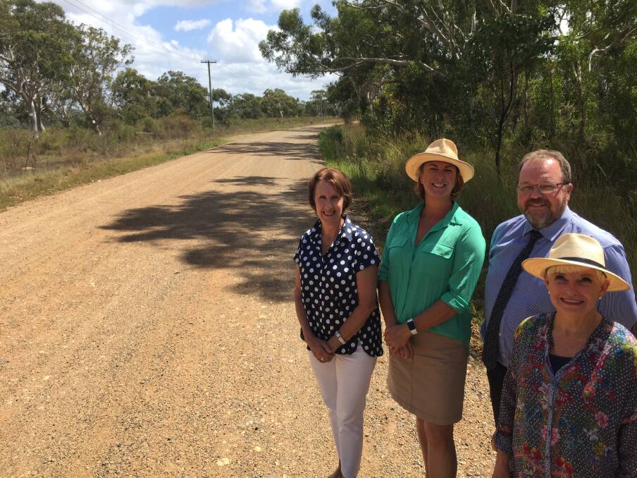 Funding: Member for Port Macquarie Leslie Williams, Oxley MP and minister for roads Melinda Pavey, Port Macquarie-Hastings Council representative Jeffrey Sharp and Kempsey Shire Council mayor Liz Campbell at Monday's funding for sealing Maria River Road.