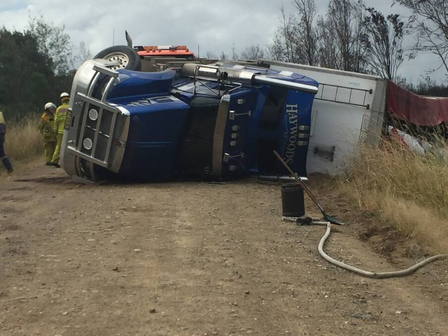 Over and out: A truck roll-over on Maria River Road has highlighted the poor condition of the unsealed link road. Photo: Peter Daniels