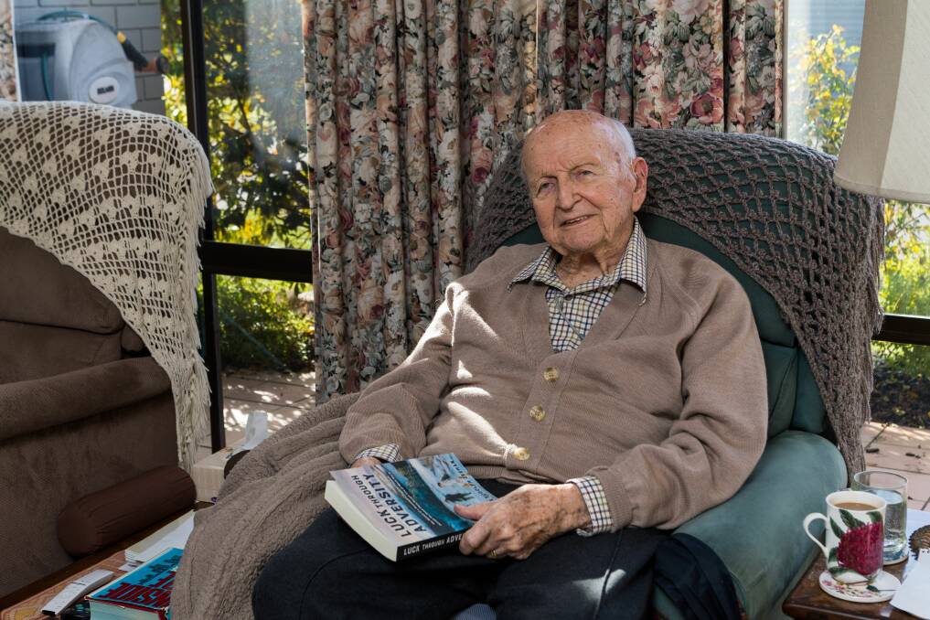 Stories: Rudy Zeeman, 100, with Luck Through Adversity, his recently published story of his escape from Nazi-occupied Holland. Picture: Phillip Biggs