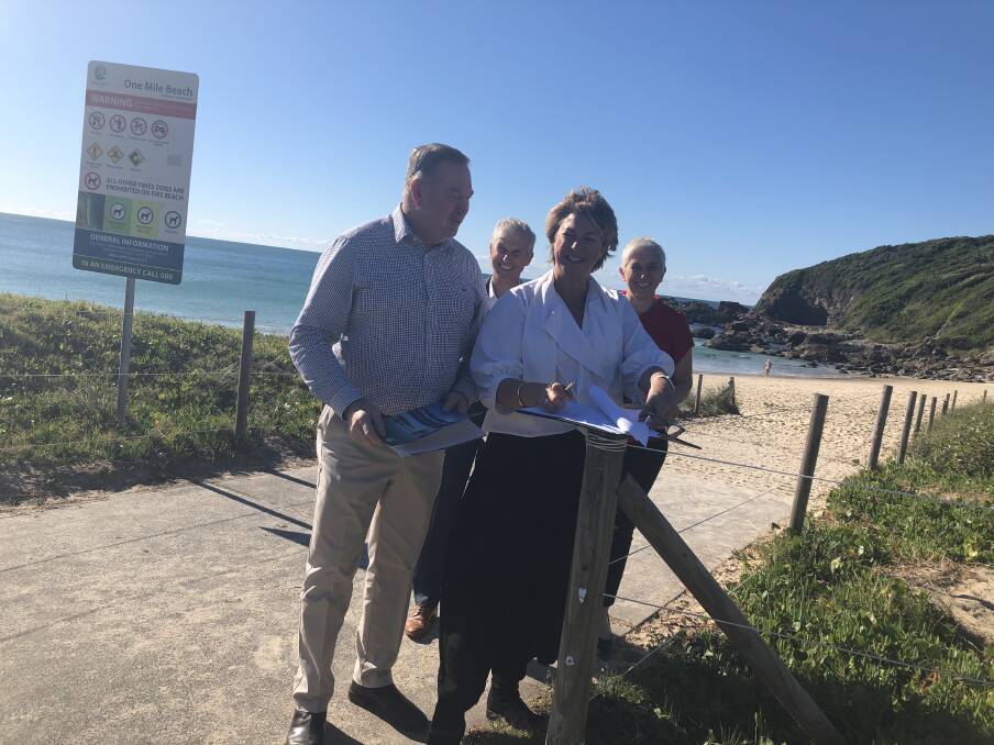 Minister for Water, Property and Housing, Melinda Pavey, signs the historic document at One Mile Beach, Forster, along with Stephen Bromhead, Prof Richard Bush and Crown Land deputy secretary, Melanie Hawyes