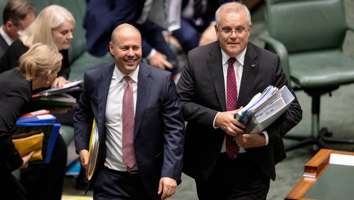 Josh Frydenberg and Scott Morrison leave question time last week. Picture: Sitthixay Ditthavong