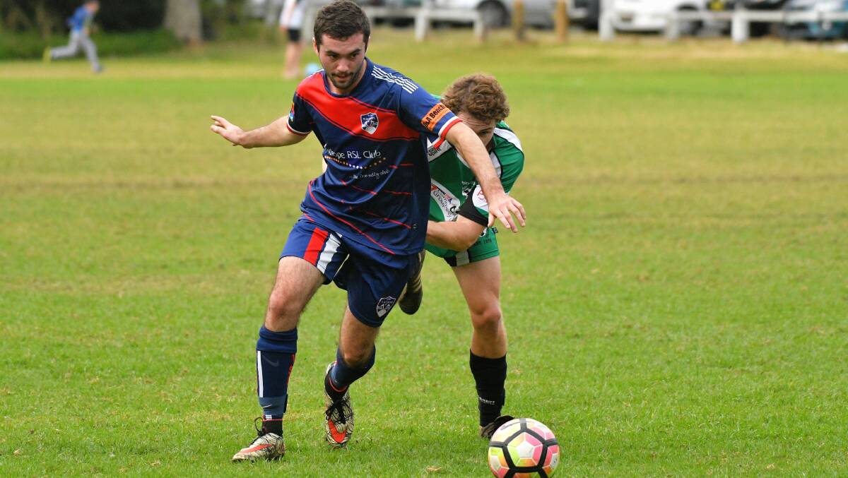 Evasive: Nick Brown gets around the Port United defence during Wauchope's 2-1 victory this season.