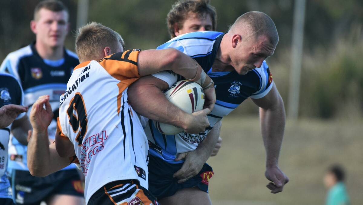 Big minutes: Port City front-rower Ben Dickson takes the ball forward.