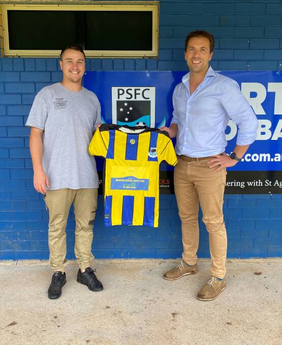 Dr Boyko (R) with Port Saints coach Oliver King (L) and the jersey Saints plan to wear. Photo: supplied
