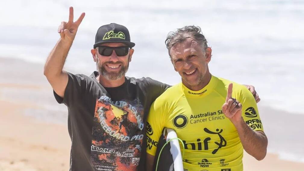 Narrow escape: Urunga surfer Matt Gallagher (right) with his mate Nick Hartigan.