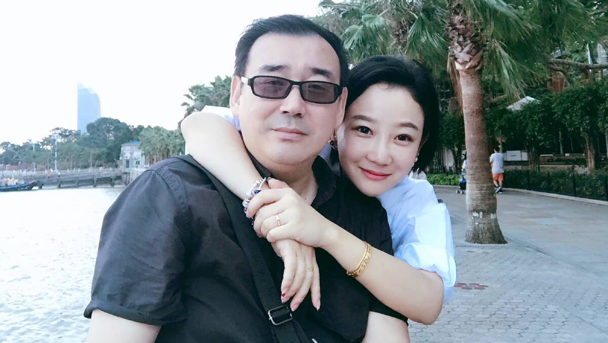 Dr Yang Hengjun, left, with his wife Yuan Xiaoliang. Picture supplied