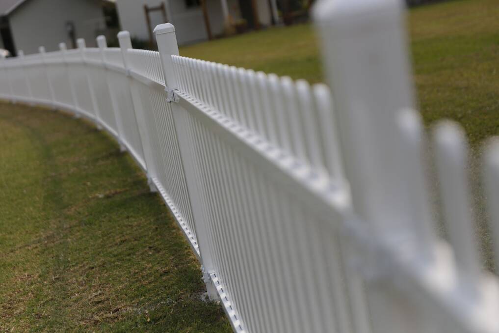 STRAIGHT AND TRUE: The new community-built fence is a thing of beauty