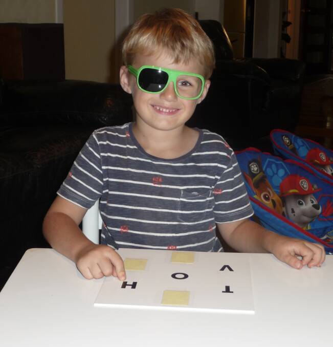 Four-year-old Darcy has his eyesight checked.