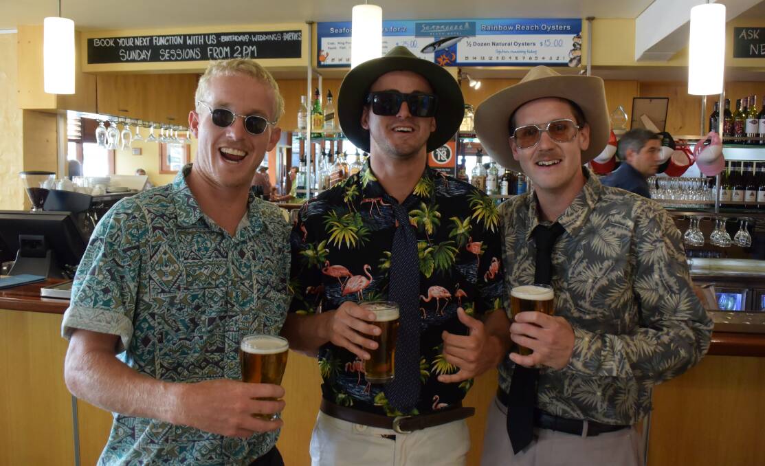 South West Rocks gentlemen Alex Dalley Luke Hogan, and Jake Atterton enjoy a pre-race beer at the Seabreeze Beach Hotel on Melbourne Cup Day 2016.