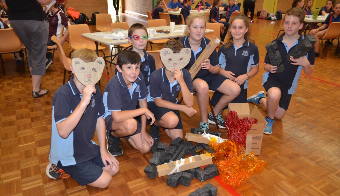 Tournament at Melville: Eventual winners East Kempsey with some of the props they'd made earlier that day. Photo: Lachlan Leeming. 