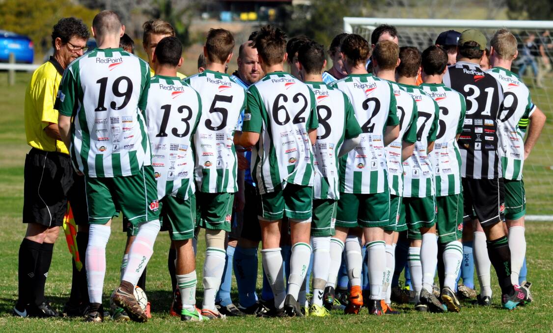 Game on: Kempsey Saints shake hands with their opponents the Taree Wildcats prior to a match during the 2016 season. Photo: Penny Tamblyn.