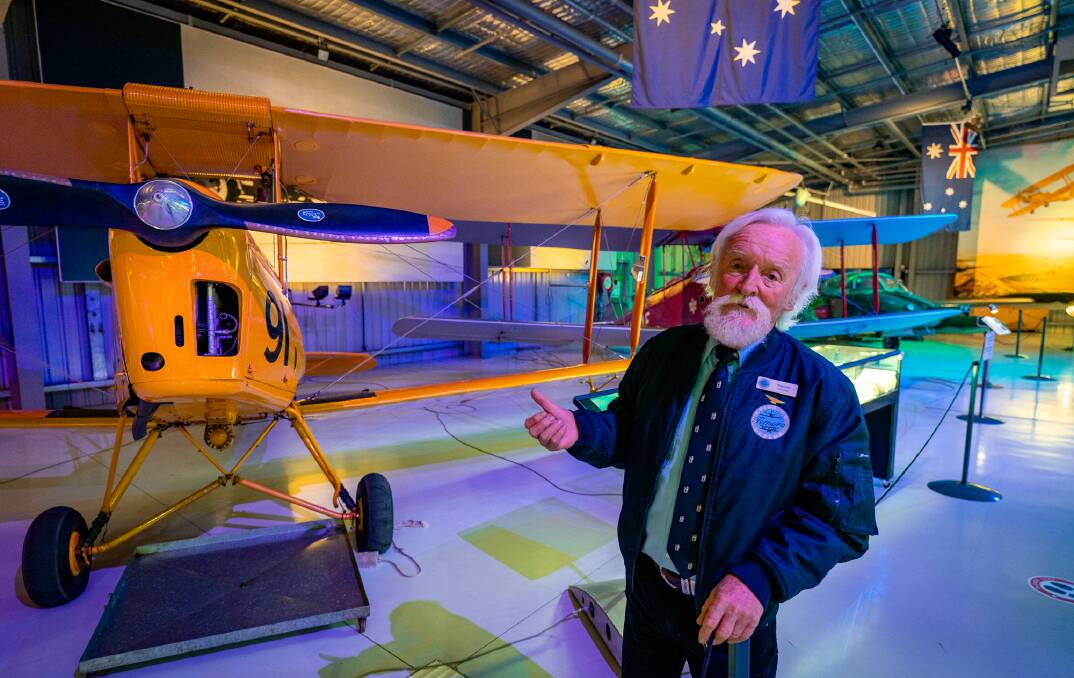 Volunteer Malcolm Chaplin gives a tour at the Temora Aviation Museum.
