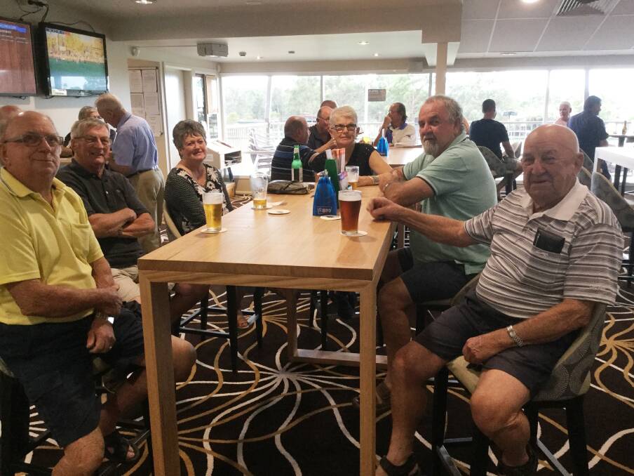 LOCALS: Enjoying a few refreshments in the newly updated club, here you can see the new modern carpet in the earthy swirl design and the new timber furniture in the oak colour.