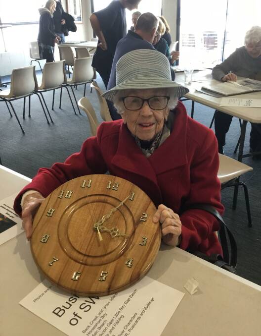 Margaret Needs with a beautiful hand made wooden clock