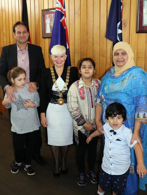 Members of the Kazmi family from Pakistan became Australian citizens at the October meeting of Council.