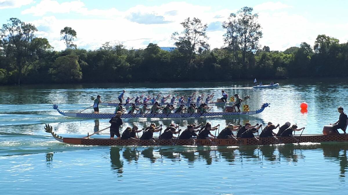 South West Rocks' women paddling strong at the Wauchope Regatta recently. Photo supplied.