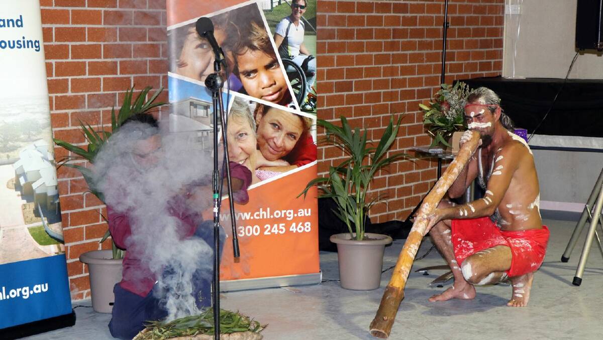 The smoking ceremony at the opening of Community Housing Ltd in Kempsey. Picture: Supplied.