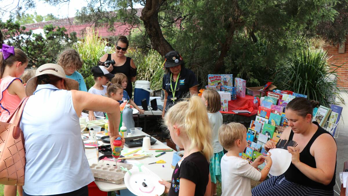 Library Assistant, Ruth Waite, with children at the Summer Reading Club Party at Kempsey Shire Library