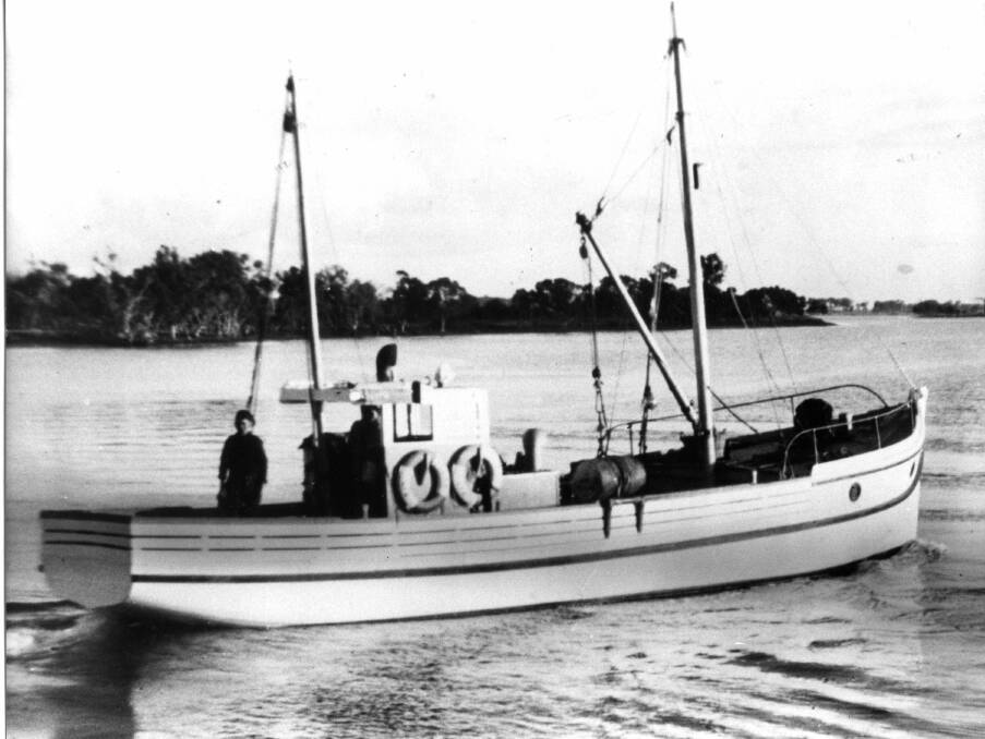 Edward James (Ted) Edwards on the deck of the fishing trawler, Elma, built on Shark Island.
