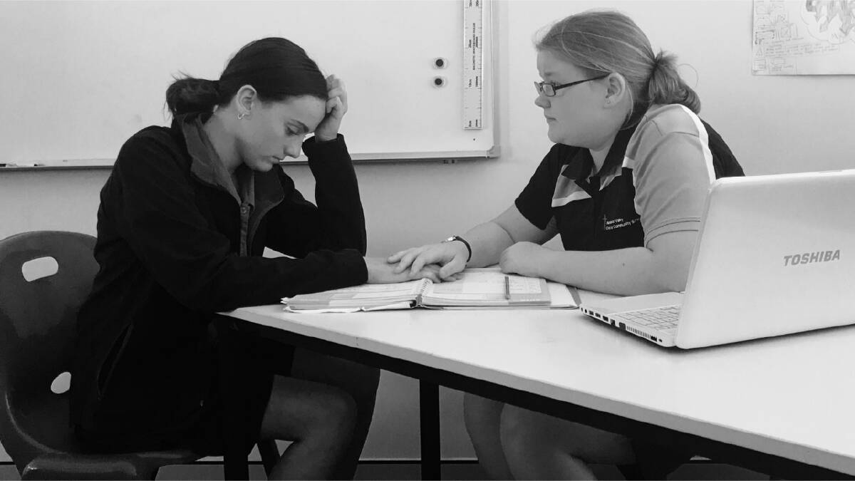 Nambucca Valley Christian Community School students Brooke and Ellesia rehearsing for their play about bullying called 'Sticks and Stones'. Photo supplied.