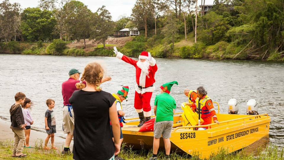 Christmas spirit: Santa will be safely delivered to the wharf by special escort from the SES boat crew.