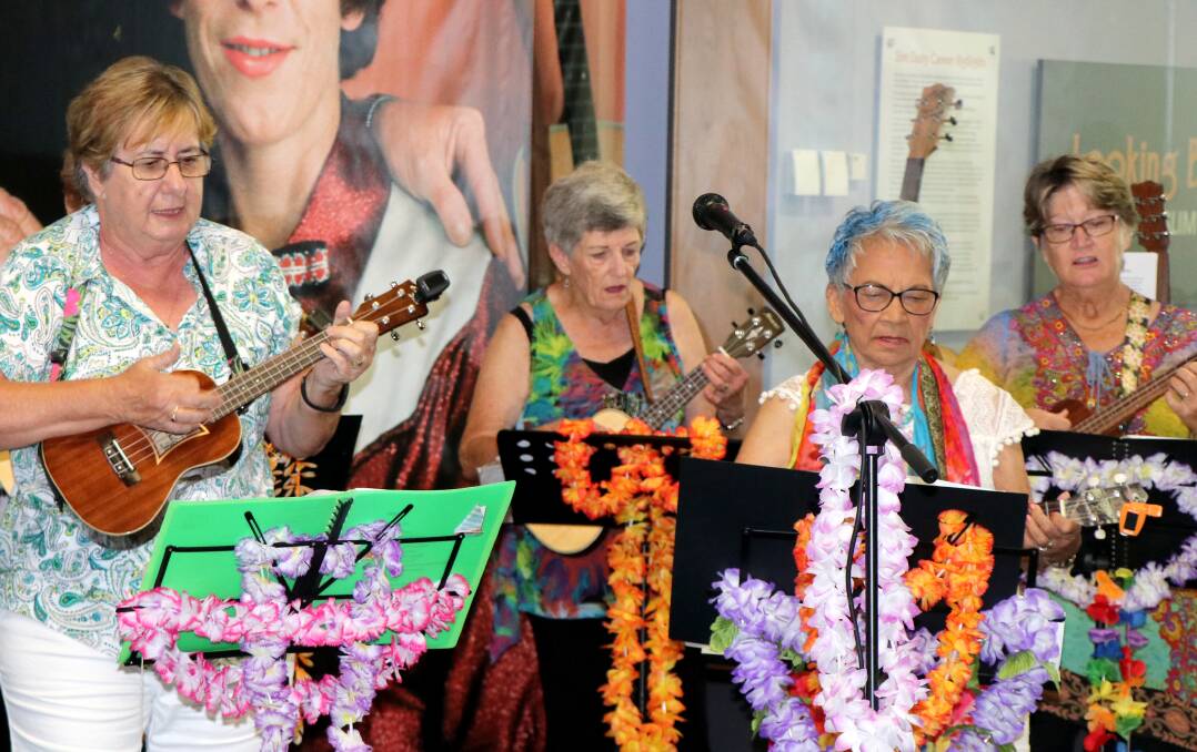 Members of the U3A South West Rocks Ukulele group entertaining the crowd at the Seniors Festival Opening.