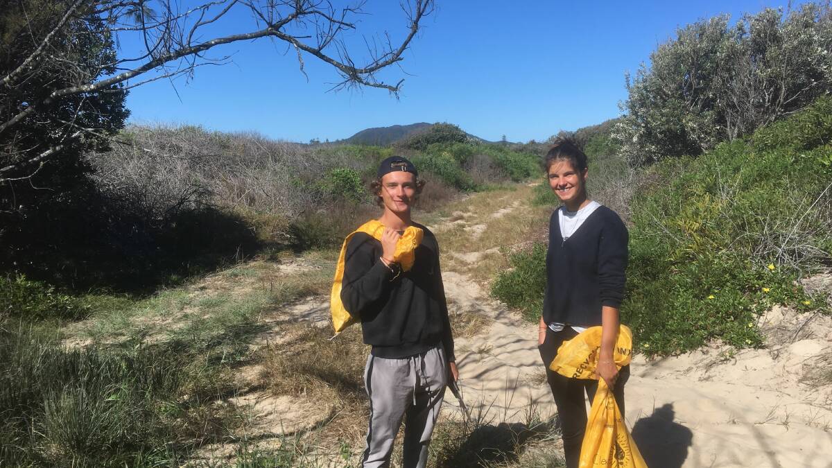 South West Rocks Community Dune Care welcomed French volunteers Noa Thiry and Marin Lambert in May. Photo: Caroline Adams.