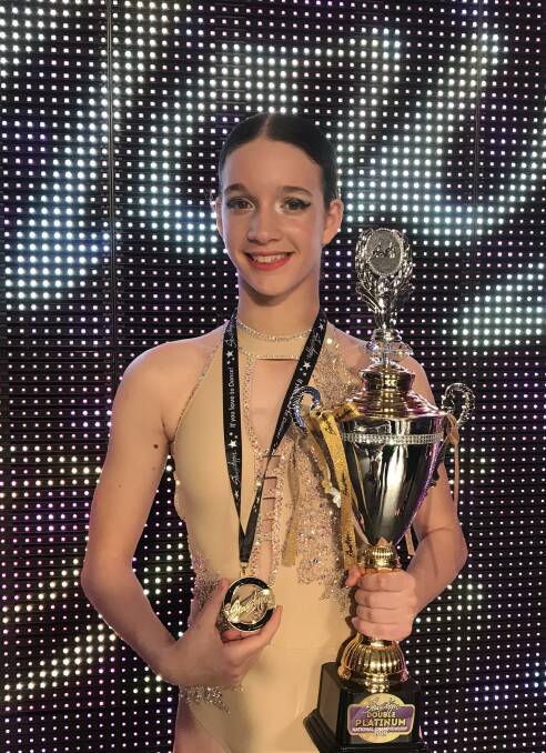 Soleil with her first place trophies from the Showstopper National Dance Championship. Photo supplied.