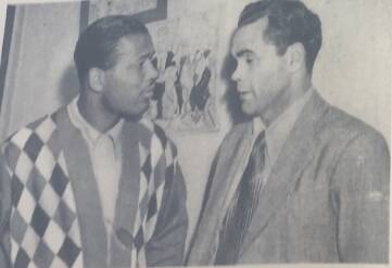 Sugar Ray Robinson and Dave Sands converse. Photo: Supplied