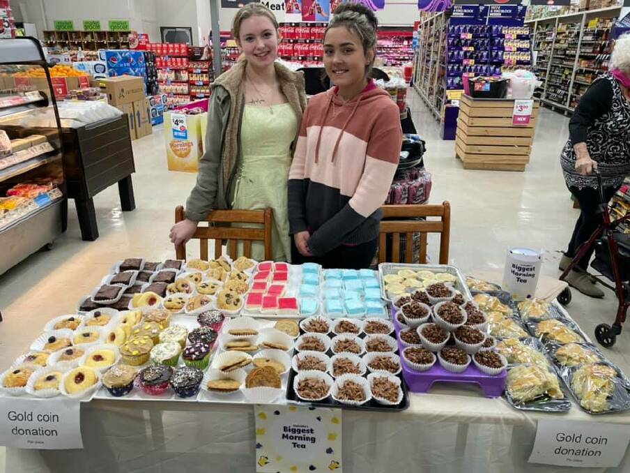 Locals testing out the delicious goods on offer at Kempsey Central IGA. Photo: Supplied 