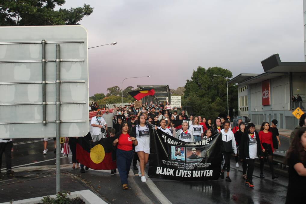 Rally participants march through the streets of Kempsey. Photo: Lachlan Harper 