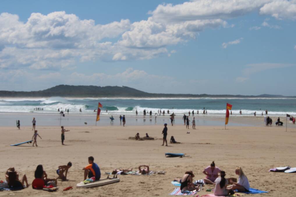 Beach goers are now flocking to Crescent Head main beach. Photo: Lachlan Harper 