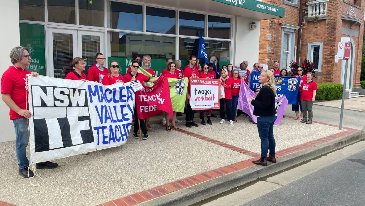 Macleay Valley teachers converge outside Member for Oxley, Melinda Pavey's office with Teachers Federation senior vice-president Amber Flohm. Photo: Lachlan Harper 