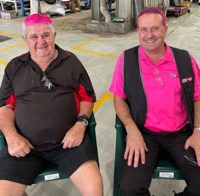 Bob and Dean Mavin sporting their pink hair during a recent breast cancer fundraiser. Photo: Mavin Truck Centre 