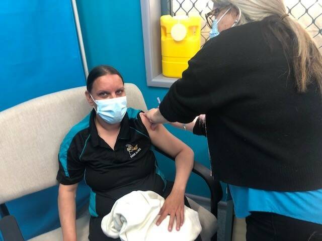 Theresa Silva being vaccinated by Kimmy Wright. Photo: Supplied 