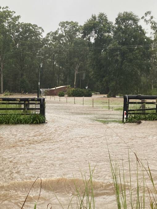 Smiths Creek Road was like a running river last Friday. Photo: Supplied