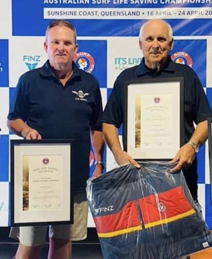 Rod McDonagh and Bruce Caldwell receiving their Long Service Officiating Awards. Photo: Supplied